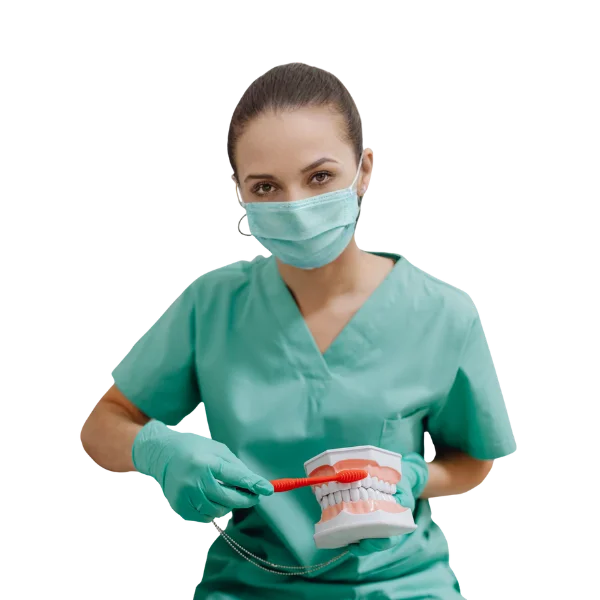 dentist_demonstrating_how_to_clean_teeth